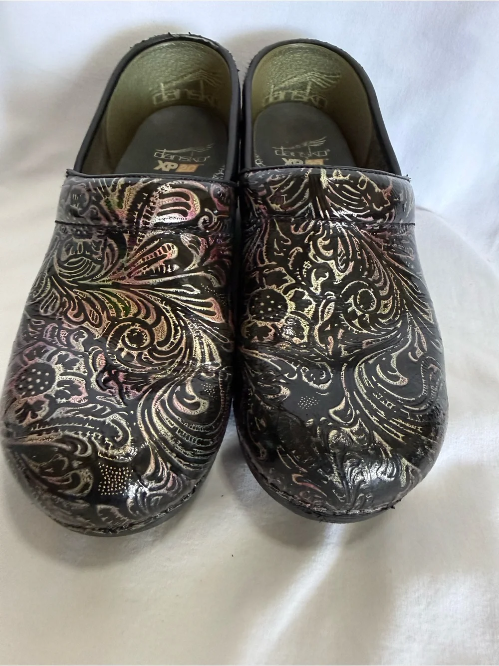 Women’s dansko XP 2.0 Slip-On Clog with Floral Metallic Pattern - Black